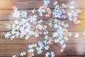 Uncollected group of puzzles on a wooden table background.