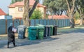 Uncollected refuse bins on a residential street