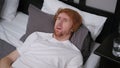 Uncomfortable Man Lying in Bed Feeling Unrest