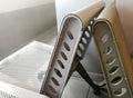 Uncomfortable metal bench / chair at airport waiting hall Royalty Free Stock Photo