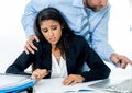 Sexual harassment at work. Disgusted employee being molested by her boss Royalty Free Stock Photo