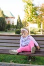 Uncomfortably Sitting Girl Royalty Free Stock Photo