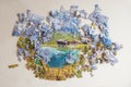 Uncompleted landscape puzzle, jigsaw pieces. mountains and lake. leisure activity