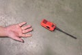 Unconscious Man Hand Falling on the Factory Floor