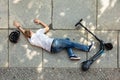 Unconscious Man Lying On Street After Accident Electric Scooter Royalty Free Stock Photo