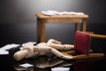 Unconscious Wooden Dummy Figure Lying On Floor