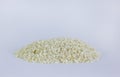 Uncooked arborio rice. Risotto rice on white background. Pile of Arborio short grain white rice isolated on white. Background of Royalty Free Stock Photo