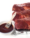 Uncooked Baby Back Ribs With BBQ Sauce Royalty Free Stock Photo