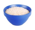 Uncooked basmati rice in a ceramic blue bowl