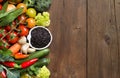 Uncooked black rice in a bowl with vegetables Royalty Free Stock Photo