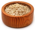 Uncooked brown rice over white Royalty Free Stock Photo