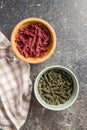 Uncooked colorful pasta with beetroot and spinach flavor Royalty Free Stock Photo