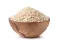 Uncooked dry rice in wooden bowl