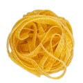 Uncooked egg pasta nest isolated on white background Royalty Free Stock Photo