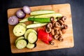 Raw Sliced Vegetables Seasoned with Olive Oil, Salt, and Pepper Royalty Free Stock Photo