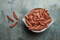 uncooked foglie di ulivo italian pasta in a bowl Royalty Free Stock Photo