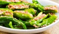 Uncooked Fresh Stuffed Green Peppers ready for cooking