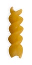 Uncooked fusilli pasta isolated on white background. Itallian spiral pasta close-up on white Royalty Free Stock Photo