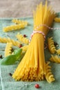 Uncooked gluten free pasta from blend of corn and rice flour