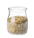 Uncooked green buckwheat grains in jar isolated on white