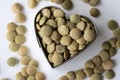 Uncooked Green Lentils in a Heart Shape