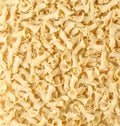 Uncooked Italian pasta Campanelle background. Gigli Pasta top view. High quality photo Royalty Free Stock Photo