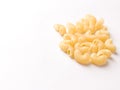 Uncooked macaroni elbow shape pasta with white background stock image. Royalty Free Stock Photo