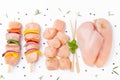 Uncooked meat skewer with peppers.Chicken Skewers breast fillet meat.Skewers with pieces of raw meat,red,yellow pepper Royalty Free Stock Photo