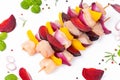 Skewers with pieces of raw meat.Raw chicken meat skewers with vegetables,plums,yellow pepper,onions,with spices,herbs Royalty Free Stock Photo