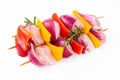 Uncooked mixed meat skewer with peppers.Raw chicken skewers with vegetables, peppers, onions, on a white background Royalty Free Stock Photo