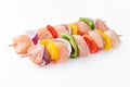 Uncooked mixed meat skewer with peppers.Skewers with pieces of raw meat, red, yellow and green pepper.Top view.Raw Royalty Free Stock Photo