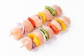 Uncooked mixed meat skewer with peppers.Skewers with pieces of raw meat, red, yellow and green pepper.Top view.Raw Royalty Free Stock Photo