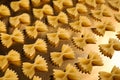 Uncooked organic farfalline pasta on table, closeup Royalty Free Stock Photo