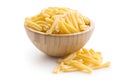 Uncooked pasta caserecce in bowl Royalty Free Stock Photo