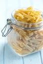 Uncooked pasta caserecce in jar Royalty Free Stock Photo