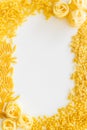 Uncooked pasta frame for italian food on white table background top view copyspace Royalty Free Stock Photo