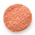 Uncooked plant based vegetarian burger patty isolated on white. Top view