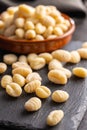 Uncooked potato gnocchi on cutting board. Tasty italian food