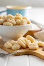 Uncooked potato gnocchi on cutting board. Tasty italian food