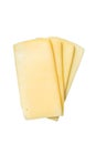 Uncooked Raclette Swiss cheese slices. High quality Isolate, white background.