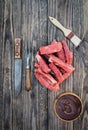 Raw Beef Ribs with BBQ Sauce and Brush over Wood Background Royalty Free Stock Photo