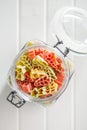Uncooked raw pasta. Various Christmas shapes. Pasta in jar on white table. Top view Royalty Free Stock Photo