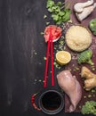 Uncooked rice with cilantro, ginger, soy sauce, oyster mushrooms, and lemon, chicken breast, red chopsticks, concept of Japanese f Royalty Free Stock Photo