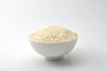 Uncooked rice, jasmine rice, mali rice,Thai jasmine rice in a white bowl ceramic on white background.