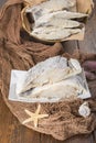 Uncooked salted cod on fishing nets Royalty Free Stock Photo