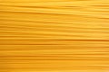 Uncooked spaghetti background, top view. Texture of pasta, closeup. Food background Royalty Free Stock Photo