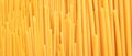 Uncooked spaghetti and macaroni pasta texture background, banner Royalty Free Stock Photo