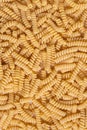 Uncooked Spiral Pasta, top view. Copy-space Royalty Free Stock Photo