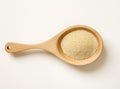 Uncooked white quinoa seeds, in the wooden bowl, isolated on pure white background, top view. Royalty Free Stock Photo