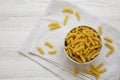 Uncooked Yellow Organic Rotini Pasta, top view. Flat lay, overhead, from above. Copy space Royalty Free Stock Photo